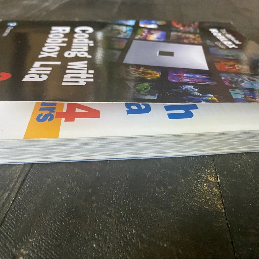 Pearson Roblox Lua Coding Guide with Black and White Cover